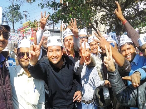 celebrate victory aap workers